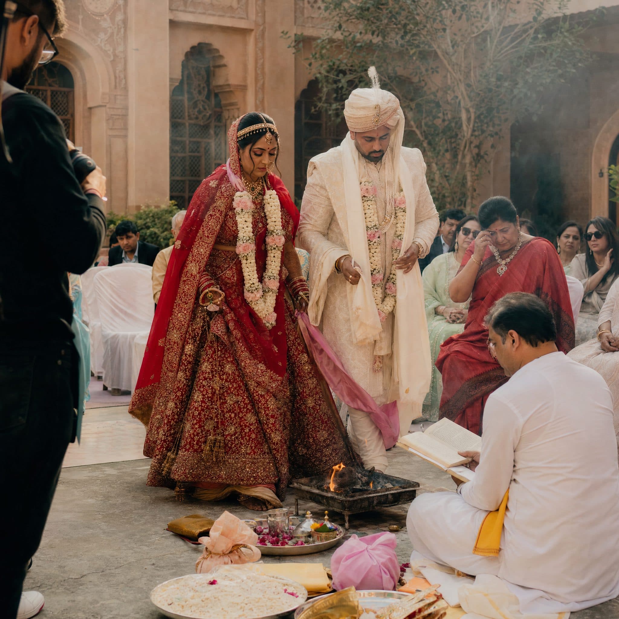 Bride and groom circling the sacred fire at the Pheras ceremony